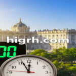 Modern clock showing the time change in Spain 2026 with high-quality background and the website link higrh.com.