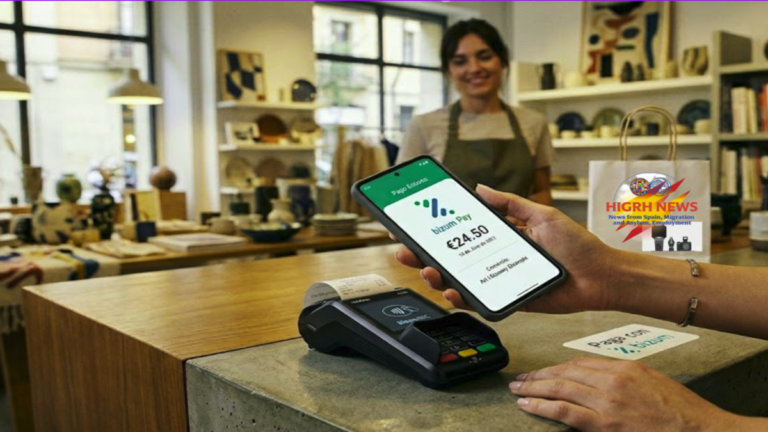A customer using the Bizum app for contactless payment via NFC at a retail store checkout.