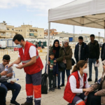 Healthcare workers provide medical assistance during the humanitarian emergency in Ceuta