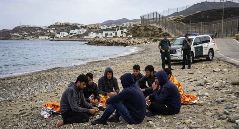 Migrants near a beach in Ceuta during the migrant crisis