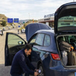 Checking the Car Before a Road Trip in Spain