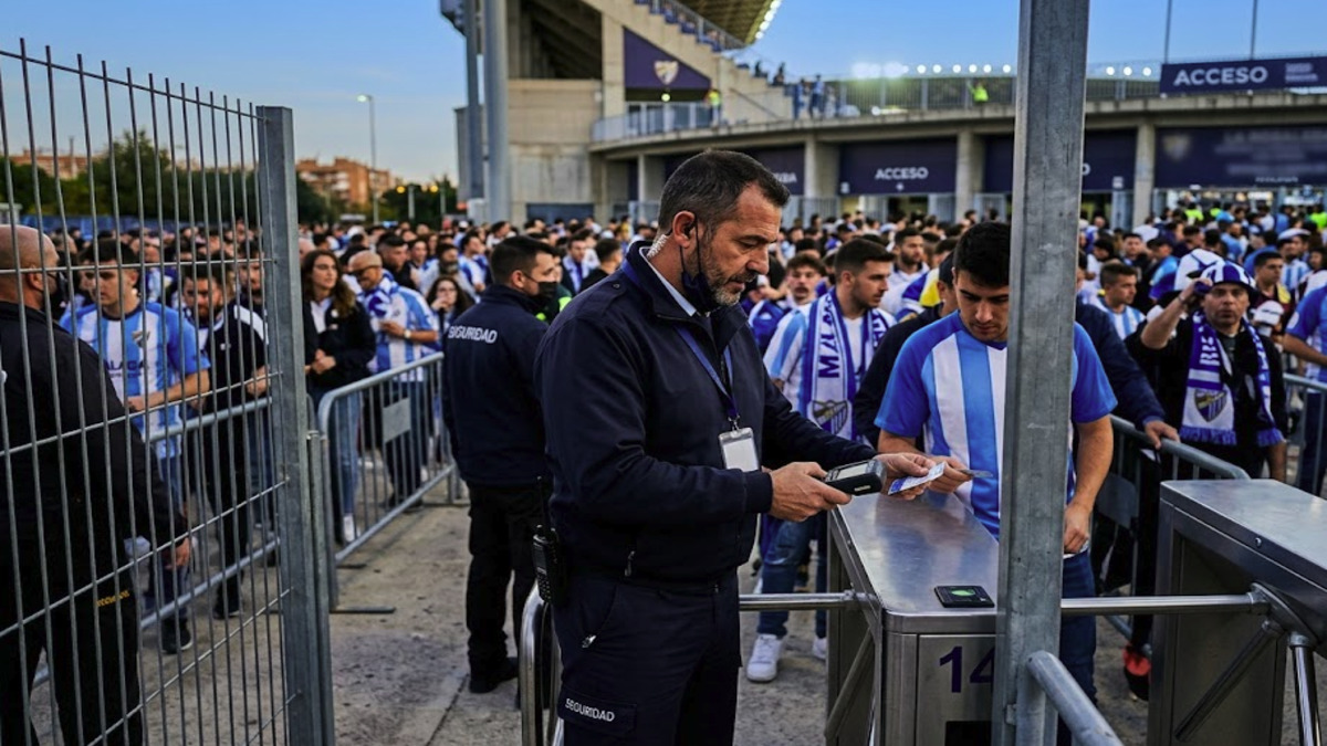 Prosegur is hiring 30 security guards in Malaga for the 2026/2027 football season 1 Security guard working at a football stadium entrance in Malaga