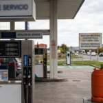 Spanish petrol station, butane gas cylinder and electricity meter representing energy price changes.