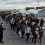 Police operation to relocate migrants from the beaches of Ceuta to the port