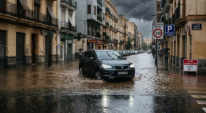 Vehicle driving through a flooded street after torrential rainfall