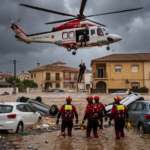A rescue helicopter evacuates a stranded resident during severe flooding caused by torrential rain in eastern Spain.